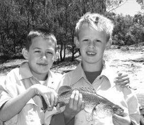 Ryle Barber (left) and Cooper Bennett with a 42cm Murray cod caught on Boxing Day below the weir at Yarrawonga.